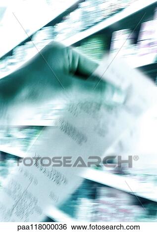 Hand holding receipt, shelves in background, blurred View Large Photo Image Stock Photograph - Hand holding receipt, shelves in background, blurred. Fotosearch