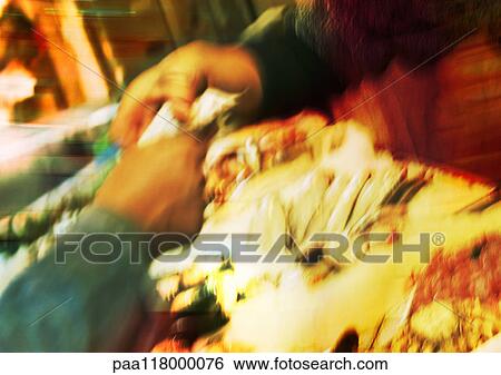 Hands exchanging money in market, blurred View Large Photo Image Stock Photograph - Hands exchanging money in market, blurred. Fotosearch
