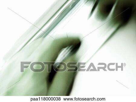 Hands on checkbook, extreme close-up, blurred View Large Photo Image Stock Photo - Hands on checkbook, extreme close-up, blurred. Fotosearch