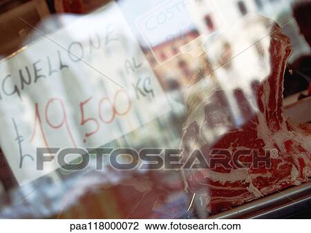 Meat and price behind glass pane View Large Photo Image Stock Image - Meat and price behind glass pane. Fotosearch