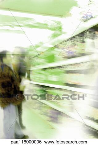 People looking at shelves in grocery store, blurred View Large Photo Image Stock Photograph - People looking at shelves in grocery store, blurred. Fotosearch
