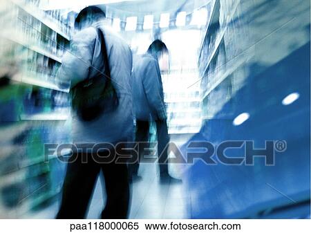 People looking at shelves in supermarket, blurred View Large Photo Image Stock Photography - People looking at shelves in supermarket, blurred. Fotosearch