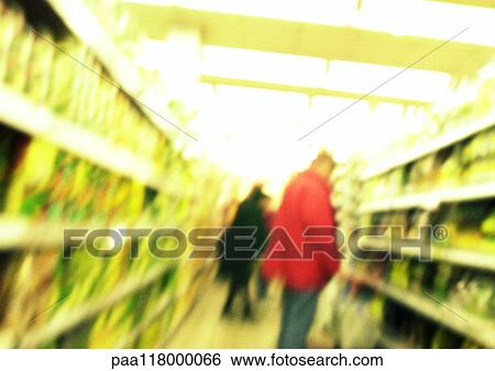 People standing in aisle in supermarket, blurred View Large Photo Image Stock Photograph - People standing in aisle in supermarket, blurred. Fotosearch