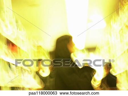 People standing in aisle of grocery store, blurred View Large Photo Image Stock Image - People standing in aisle of grocery store, blurred. Fotosearch