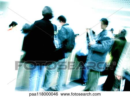 People standing in line, blurred View Large Photo Image Stock Photograph - People standing in line, blurred. Fotosearch