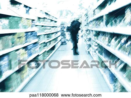 Person standing in aisle in supermarket, blurred View Large Photo Image Stock Photo - Person standing in aisle in supermarket, blurred. Fotosearch