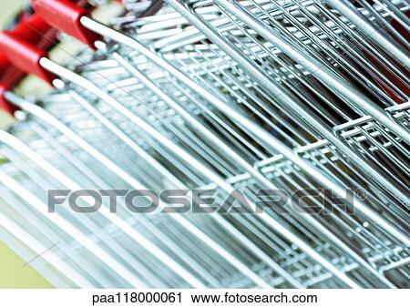 Shopping carts, extreme close-up View Large Photo Image Stock Image - Shopping carts, extreme close-up. Fotosearch