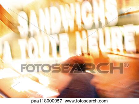 Sign saying "sandwiches served all day" in French, blurred View Large Photo Image Stock Photo - Sign saying "sandwiches served all day" in French, blurred. Fotosearch