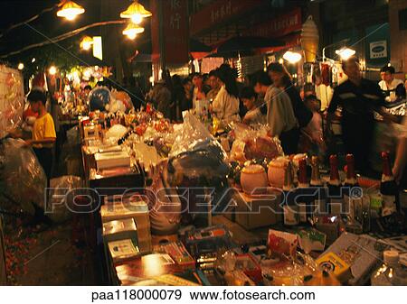 Street market at night View Large Photo Image Stock Photo - Street market at night. Fotosearch