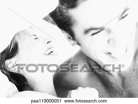 Couple laughing, close-up, b&w View Large Photo Image Stock Image - Couple laughing, close-up, b&w. Fotosearch