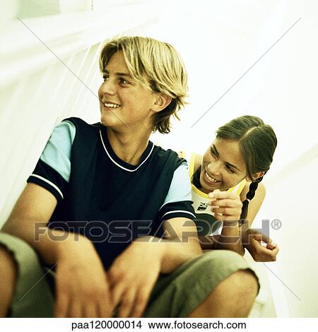 Boy and girl smiling View Large Photo Image Picture - Boy and girl smiling. Fotosearch
