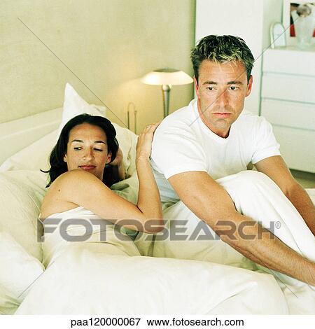 Couple in bed View Large Photo Image Stock Photo - Couple in bed. Fotosearch