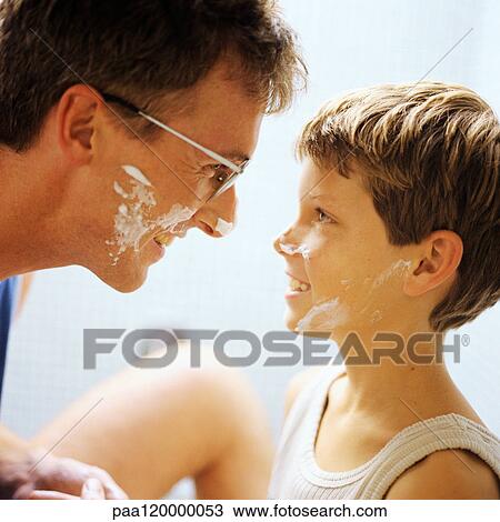 Father and son with shaving cream on faces, side view View Large Photo Image Stock Image - Father and son with shaving cream on faces, side view. Fotosearch