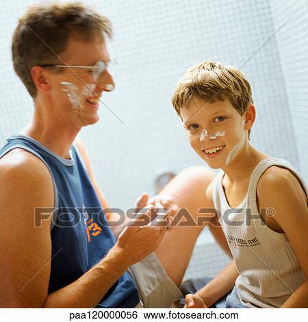 Father and son with shaving cream on faces, smiling View Large Photo Image Stock Photograph - Father and son with shaving cream on faces, smiling. Fotosearch