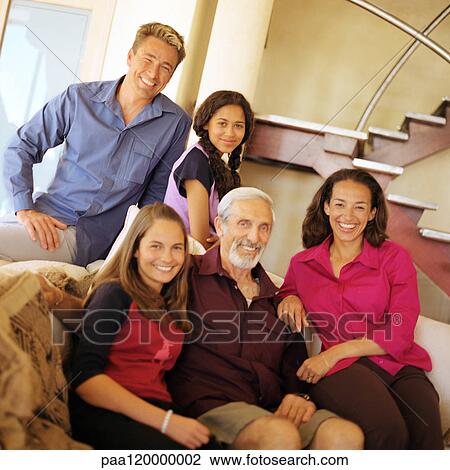 Grandfather, parents and daughters smiling View Large Photo Image Stock Image - Grandfather, parents and daughters smiling. Fotosearch