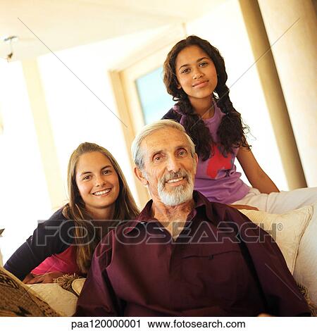 Senior man and girls smiling View Large Photo Image Stock Image - Senior man and girls smiling. Fotosearch