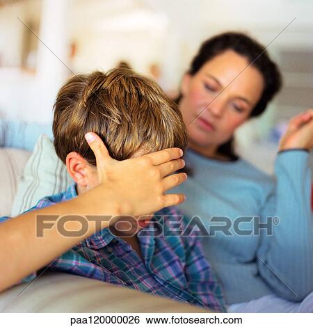 Woman and child with hand on head View Large Photo Image Stock Photograph - Woman and child with hand on head. Fotosearch