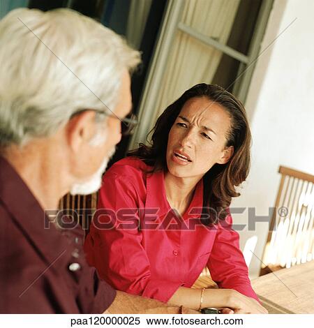 Woman speaking with senior man View Large Photo Image Stock Photography - Woman speaking with senior man. Fotosearch