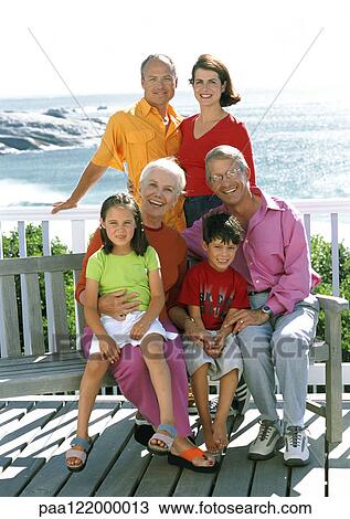 Family portrait in front of sea View Large Photo Image Stock Image - Family portrait in front of sea. Fotosearch