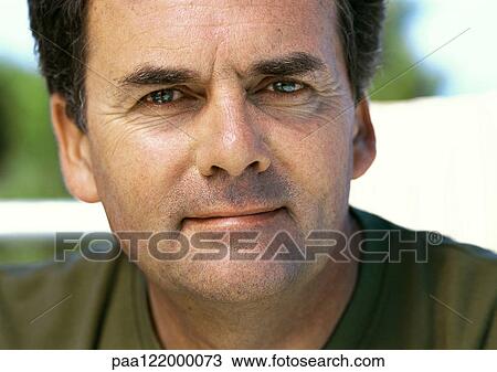 Mature man smiling, close-up, portrait View Large Photo Image Stock Image - Mature man smiling, close-up, portrait. Fotosearch