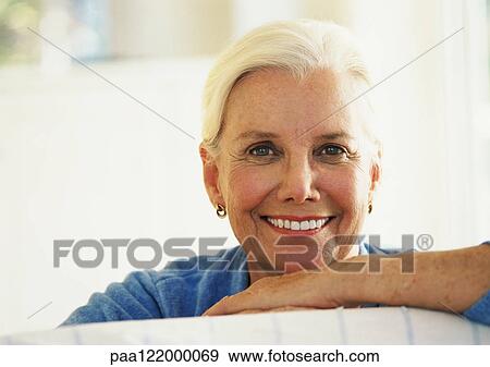 Mature woman smiling, portrait View Large Photo Image Stock Photo - Mature woman smiling, portrait. Fotosearch