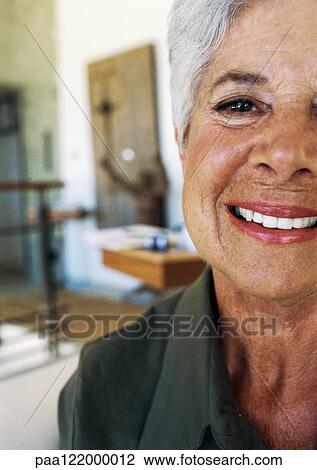 Senior woman smiling, partial view, close-up View Large Photo Image Stock Image - Senior woman smiling, partial view, close-up. Fotosearch