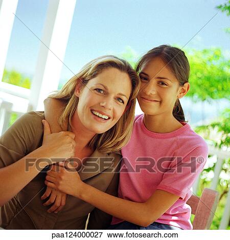 Mother and daughter hugging, portrait View Large Photo Image Stock Photo - Mother and daughter hugging, portrait. Fotosearch