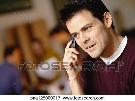 Man using cell phone, close-up View Large Photo Image Stock Photo - Man using cell phone, close-up. Fotosearch