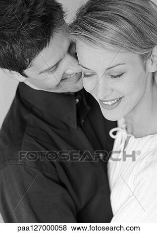 Couple smiling, close-up, b&w View Large Photo Image Stock Photo - Couple smiling, close-up, b&w. Fotosearch
