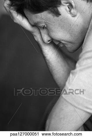 Man holding head, side view, close-up, b&w View Large Photo Image Stock Image - Man holding head, side view, close-up, b&w. Fotosearch