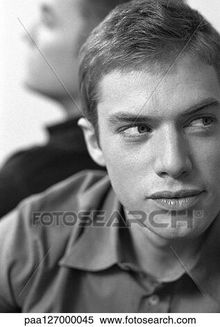 Two men, back to back, close-up, b&w View Large Photo Image Stock Photography - Two men, back to back, close-up, b&w. Fotosearch