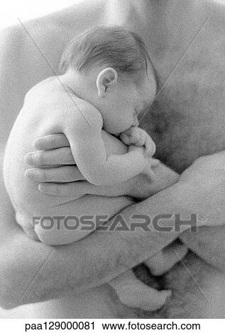 Father holding sleeping infant against bare chest, b&w View Large Photo Image Stock Image - Father holding sleeping infant against bare chest, b&w. Fotosearch
