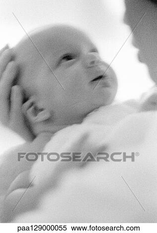 Infant in mother's hands, close-up, b&w View Large Photo Image Stock Photography - Infant in mother's hands, close-up, b&w. Fotosearch