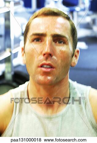 Man in gym, close-up View Large Photo Image Stock Photo - Man in gym, close-up. Fotosearch