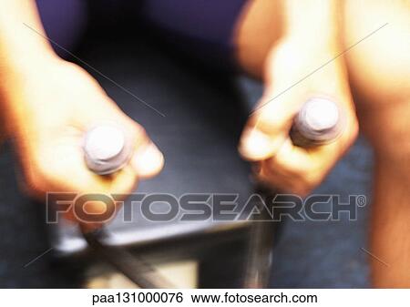 Man's hands on weight machine View Large Photo Image Stock Photograph - Man's hands on weight machine . Fotosearch