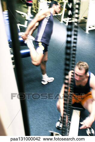 People working out in gym View Large Photo Image Stock Image - People working out in gym. Fotosearch