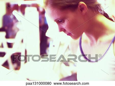 Woman in gym, blurred View Large Photo Image Stock Image - Woman in gym, blurred. Fotosearch