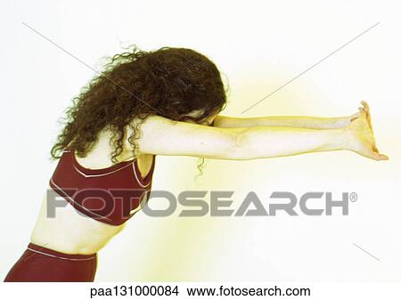 Woman stretching View Large Photo Image Picture - Woman stretching. Fotosearch