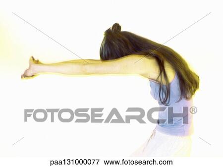Woman stretching, side view View Large Photo Image Stock Photo - Woman stretching, side view. Fotosearch