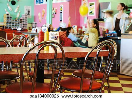 Children having party in restaurant, empty tables in foreground. View Large Photo Image Stock Photography - Children having party in restaurant, empty tables in foreground.. Fotosearch