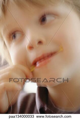 Stock Image - Young child, close-up, blurred.. Fotosearch