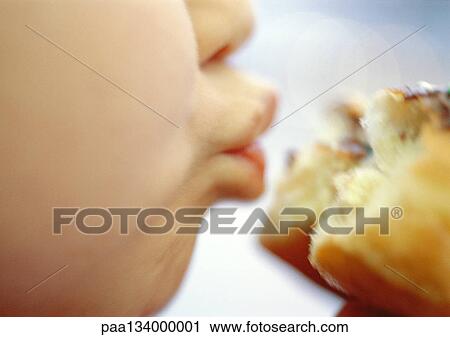 Young child eating sandwich, close-up. View Large Photo Image Stock Image - Young child eating sandwich, close-up.. Fotosearch