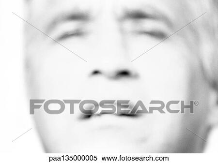 Mature man squinting, close-up, portrait, blurred, b&w View Large Photo Image Stock Photography - Mature man squinting, close-up, portrait, blurred, b&w. Fotosearch
