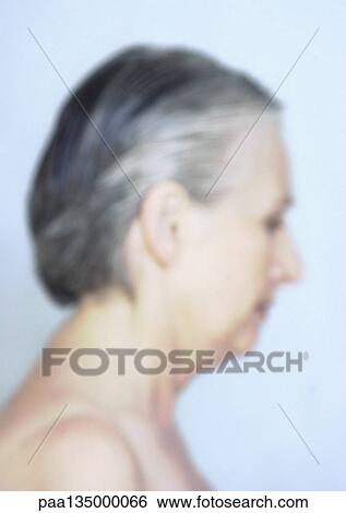 Mature woman, side view, blurred View Large Photo Image Stock Photograph - Mature woman, side view, blurred. Fotosearch