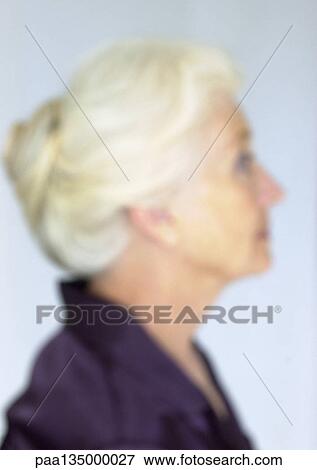 Mature woman, side view, close-up, portrait, blurred View Large Photo Image Stock Photo - Mature woman, side view, close-up, portrait, blurred. Fotosearch