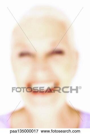 Mature woman smiling, close-up, portrait, blurred View Large Photo Image Stock Photo - Mature woman smiling, close-up, portrait, blurred. Fotosearch