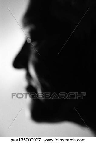 Stock Photo - Senior man, side view, blurred, clseo-up, b&w. Fotosearch