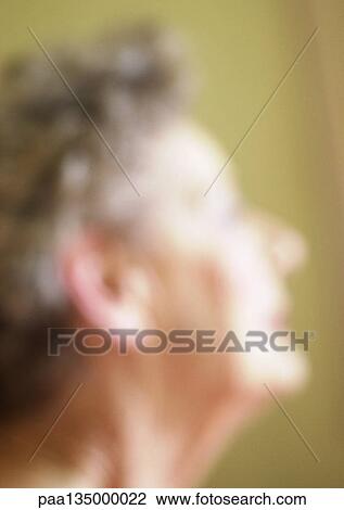 Senior woman, side view, close-up, portrait, blurred View Large Photo Image Stock Image - Senior woman, side view, close-up, portrait, blurred. Fotosearch