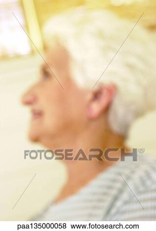 Senior woman, side view, close-up, portrait, blurred View Large Photo Image Stock Photo - Senior woman, side view, close-up, portrait, blurred. Fotosearch