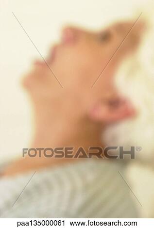 Senior woman with head back, side view, blurred View Large Photo Image Stock Image - Senior woman with head back, side view, blurred. Fotosearch